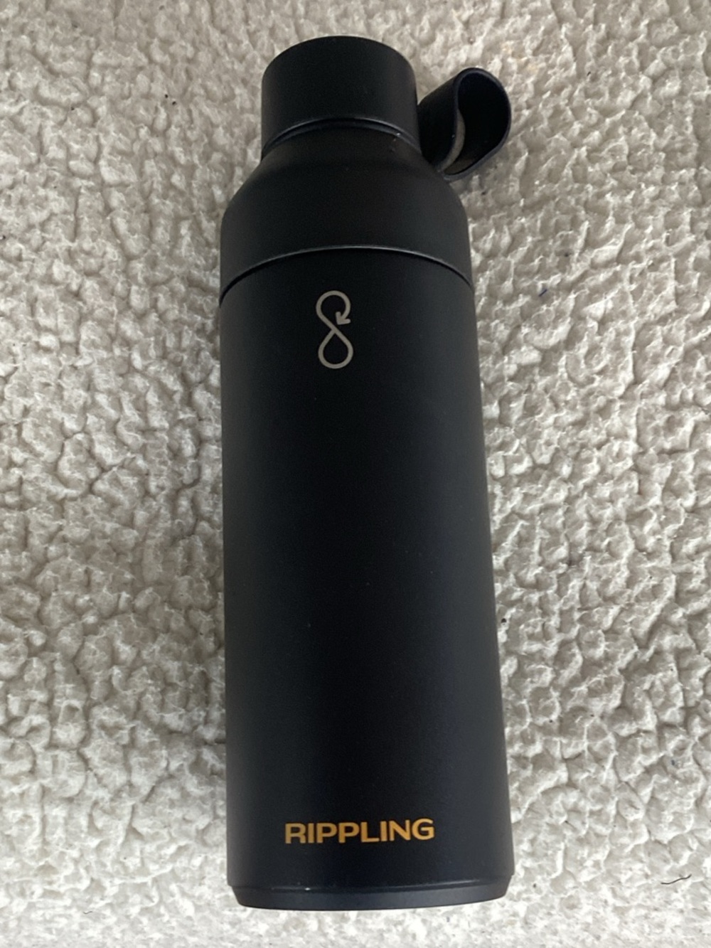 Rippling Black Stainless Water Bottle with Loop Lid by ocean bottle
